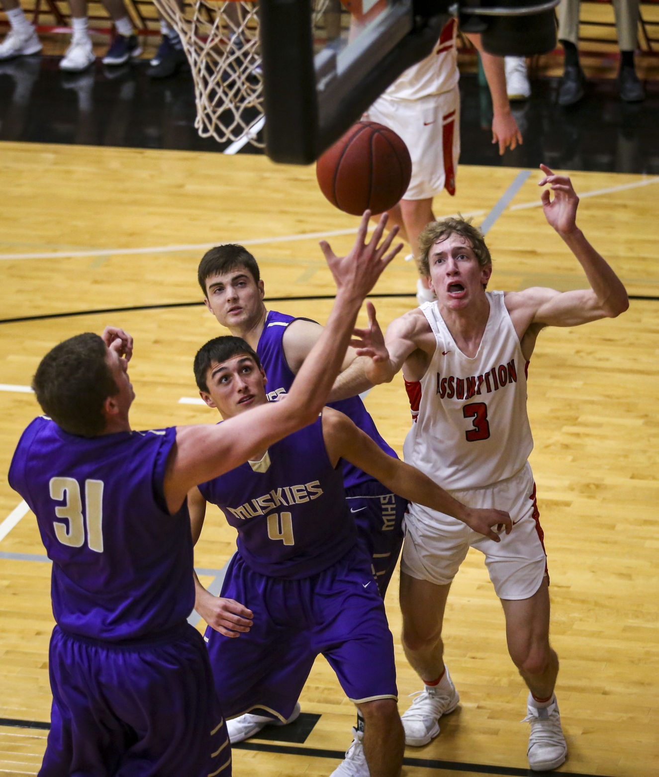 010918-MUSCATINE-ASSUMPTION-BASKETBALL-011